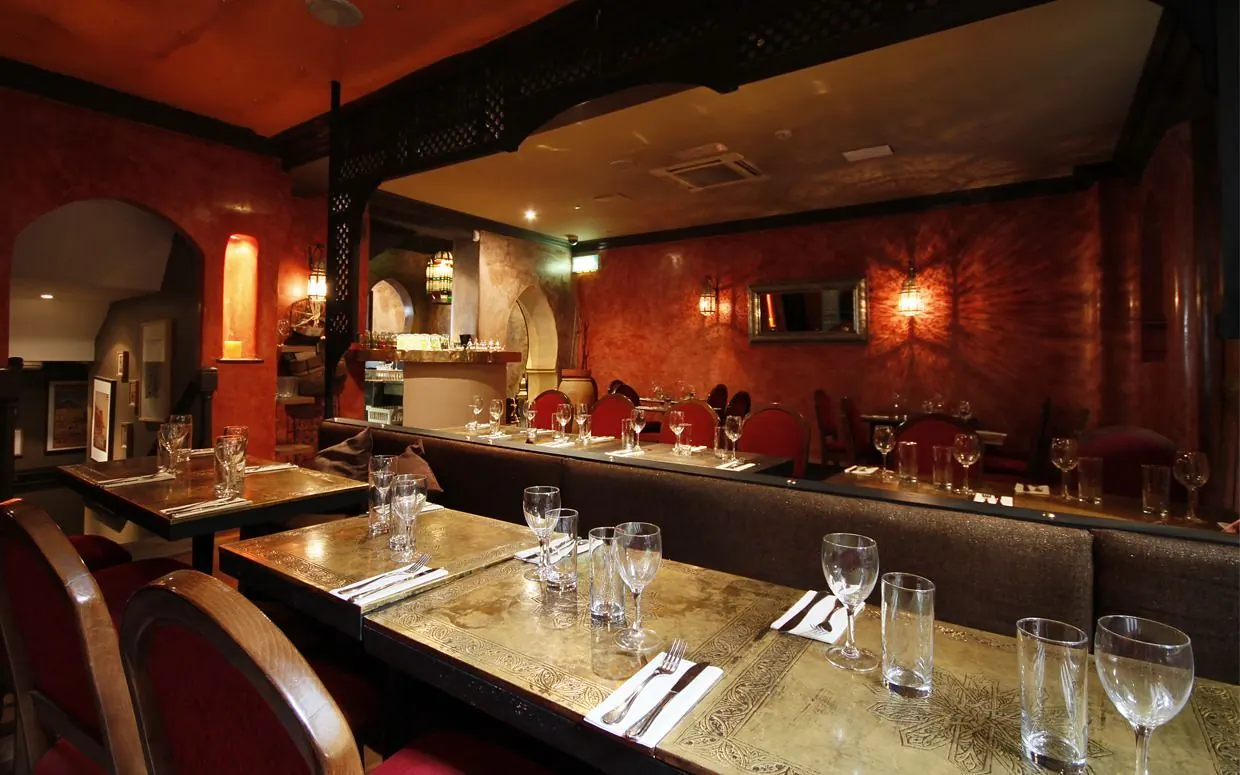 The main dining room at Dada set for an evening party